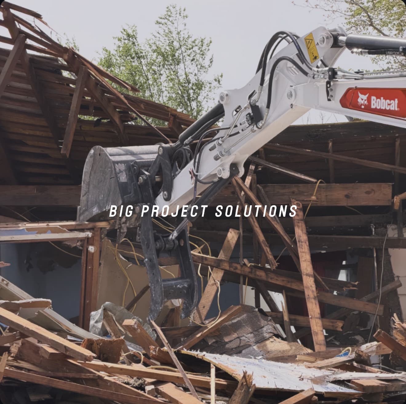 Residential house demolition with a Bobcat E60 at work in the Oklahoma City metro