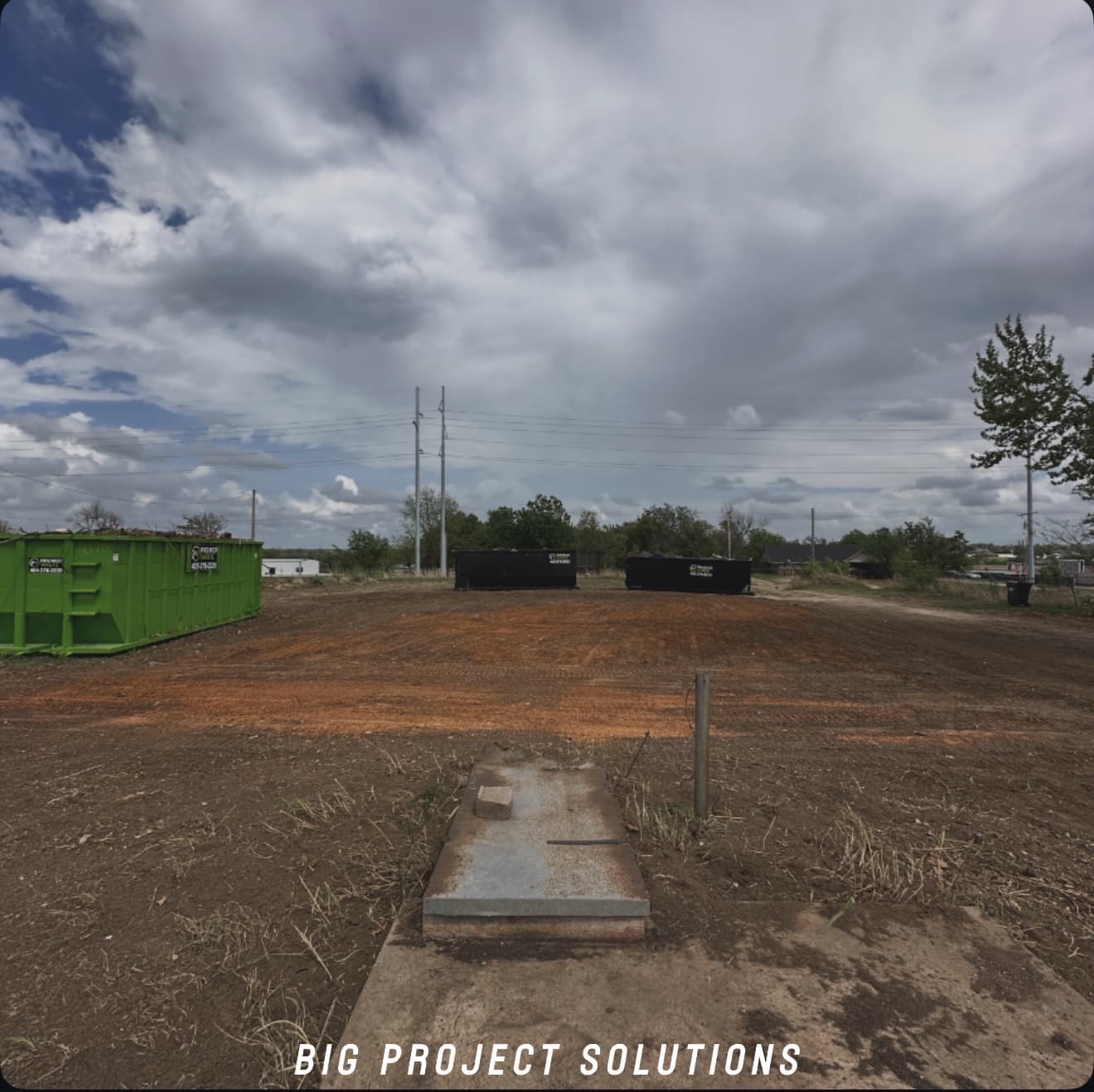 Graded red dirt lot after a full structure removal in the Oklahoma City metro