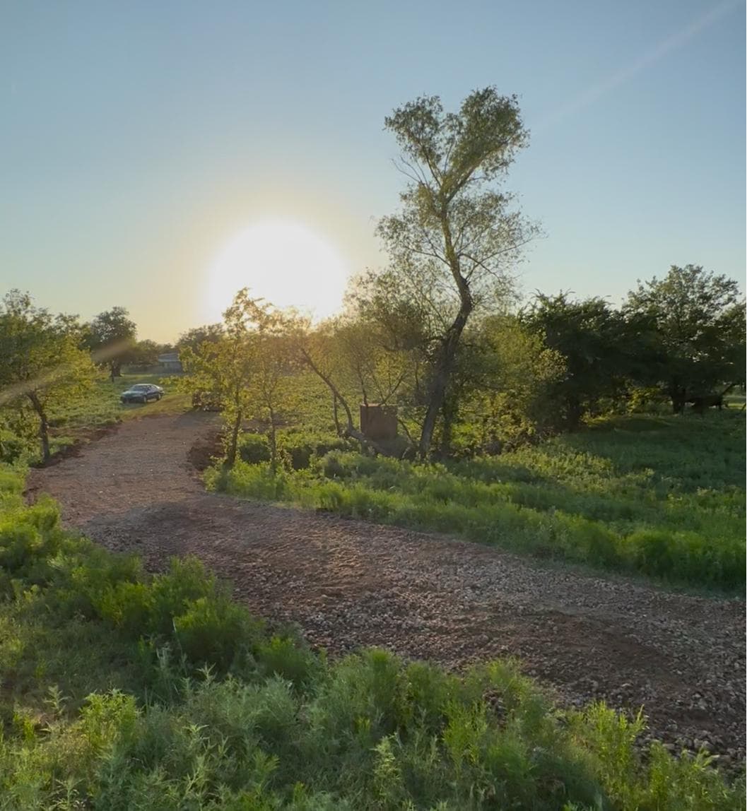 Gravel driveway installed and compacted by Big Project Solutions on Oklahoma acreage