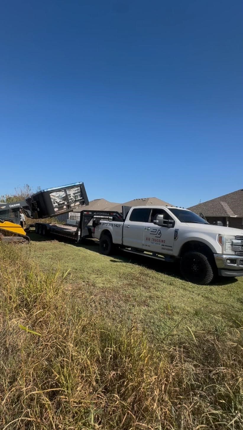 Big Project Solutions branded truck and trailer on a hauling run across the Oklahoma City metro